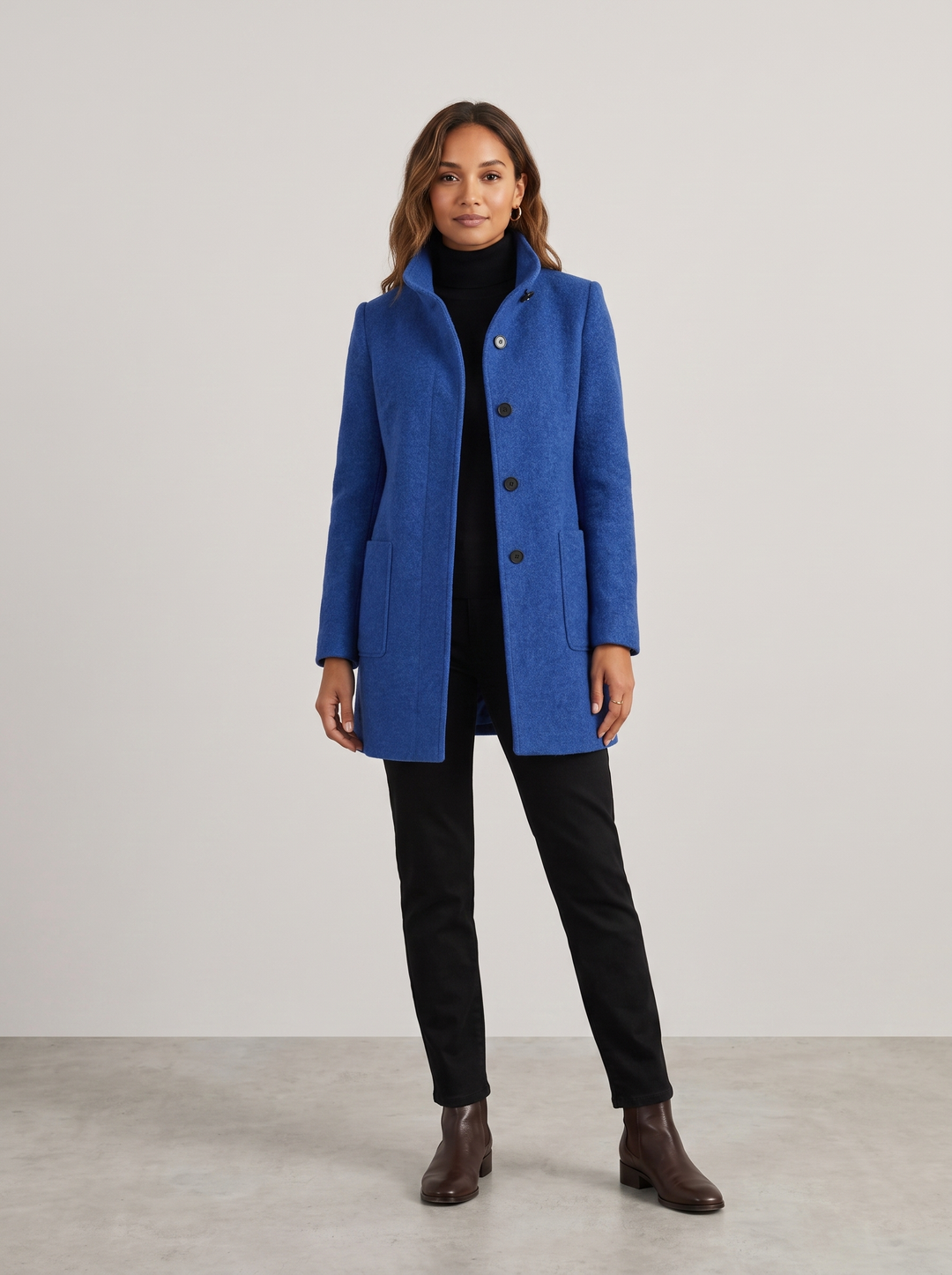 Janet | Women's Timeless Wool Blend Overcoat in cobalt blue, worn by a model, full-length studio photo