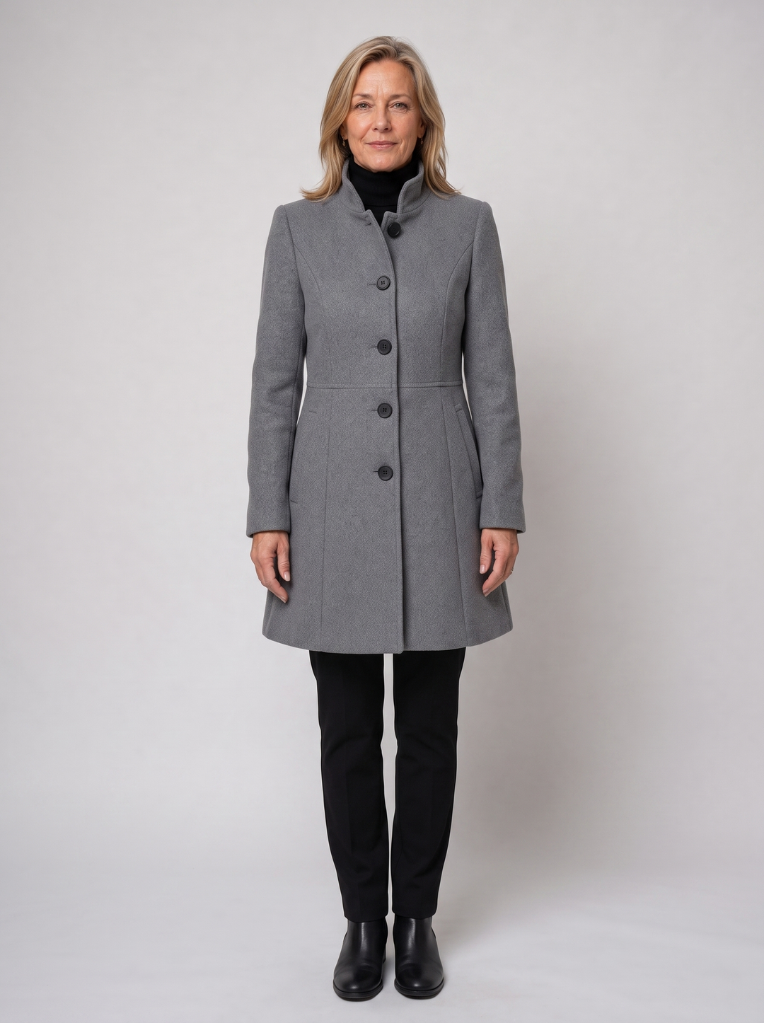 Lenora | Women's Classic Fit & Flare Coat in grey, worn by a model, full-length studio photo