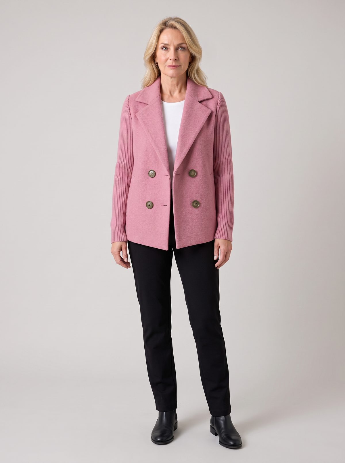 Caroline | Women's Knit Sleeve Blazer Coat in pink, worn by a model, full-length studio photo