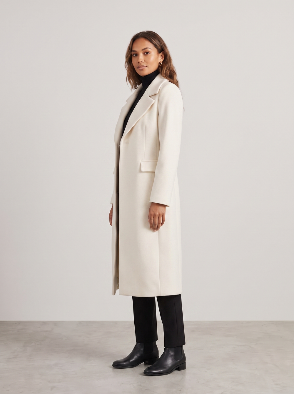 Antonia | Women's Elegant Long Coat, side three-quarter view, studio photo