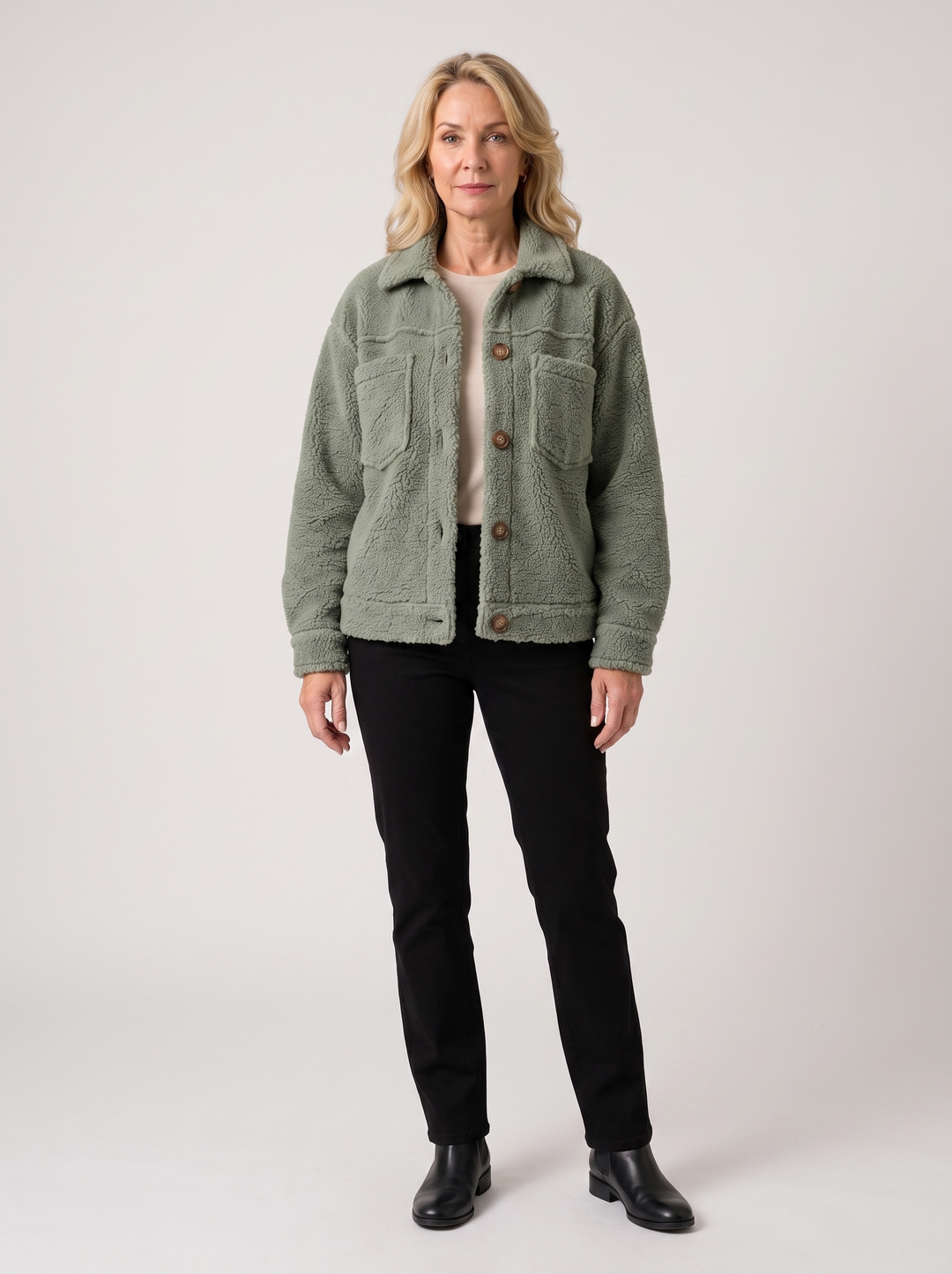 Megan | Women's Cozy Fleece Jacket in sage green, worn by a model, full-length studio photo
