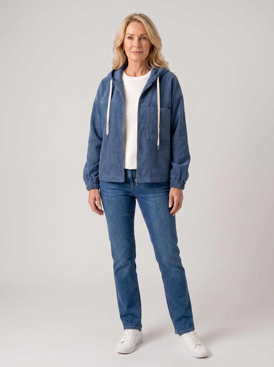 Natalie | Women's Hooded Corduroy Autumn Jacket in blue, worn by a model, full-length studio photo