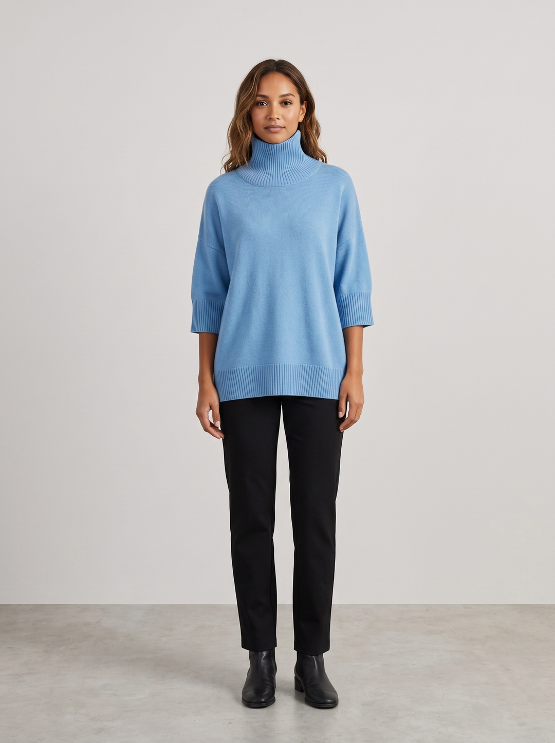 Debra | Women's Comfy Oversized Turtleneck Sweater, worn by a model, full-length studio photo