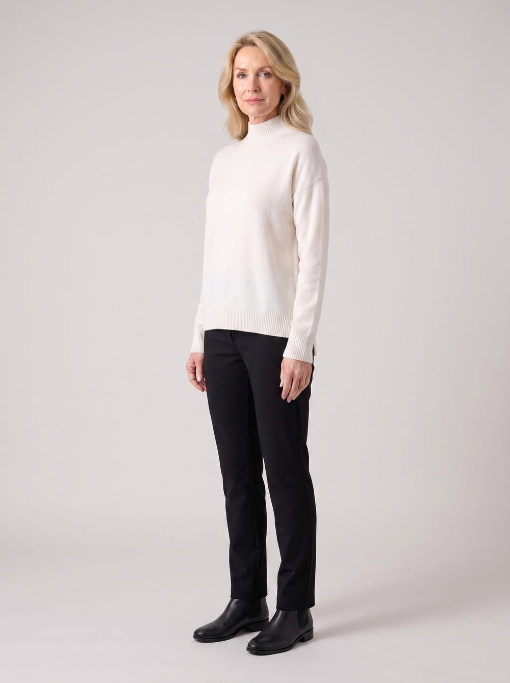 Elaine | Women's Cozy Mock-Neck Knit Sweater, side three-quarter view, studio photo
