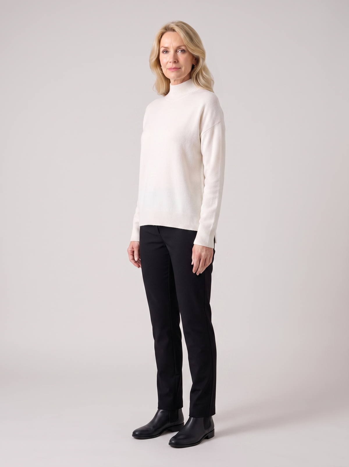 Elaine | Women's Cozy Mock-Neck Knit Sweater, side three-quarter view, studio photo