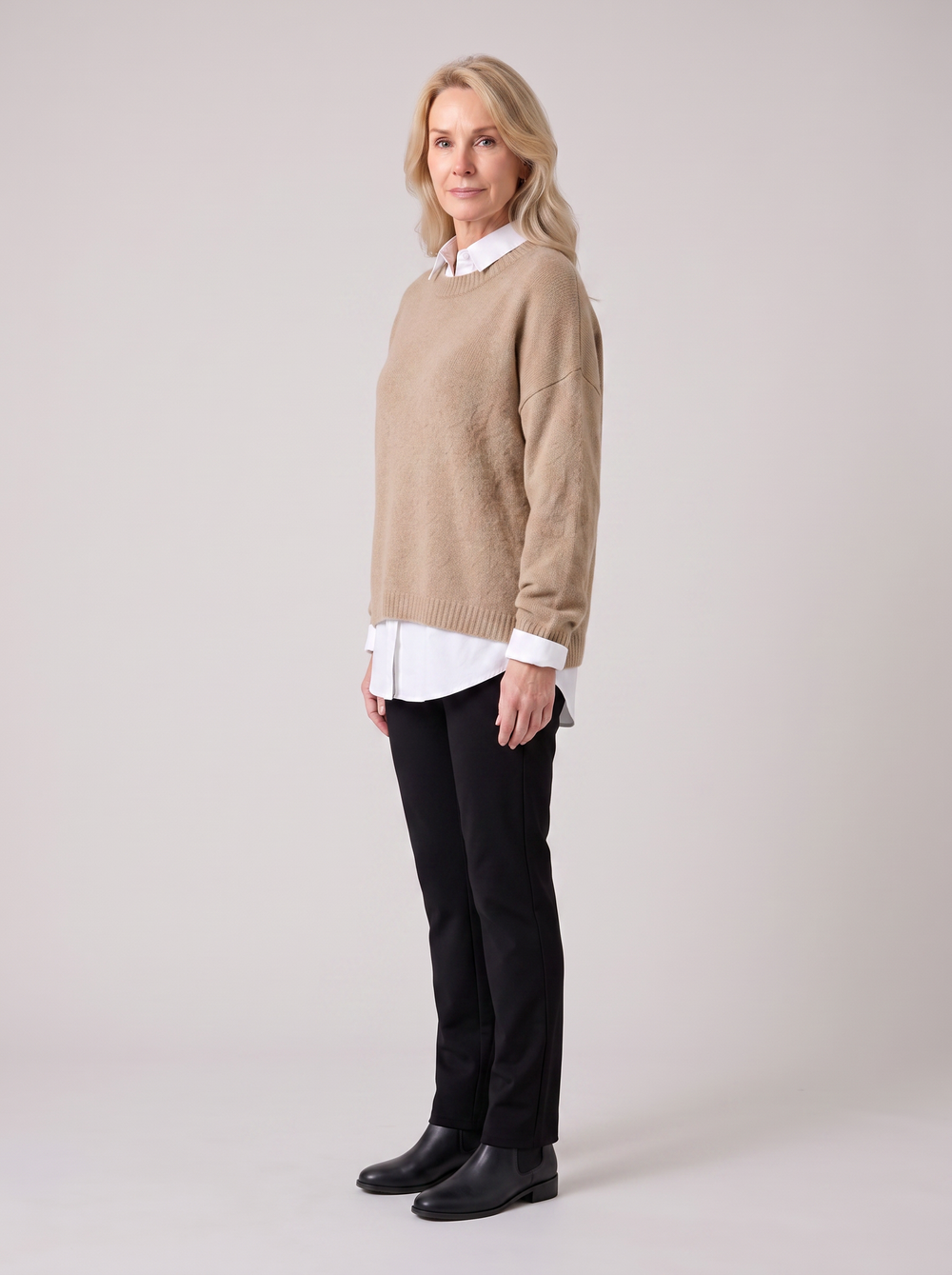 Eileen | Women's Layered Sweater with Collar, side three-quarter view, studio photo