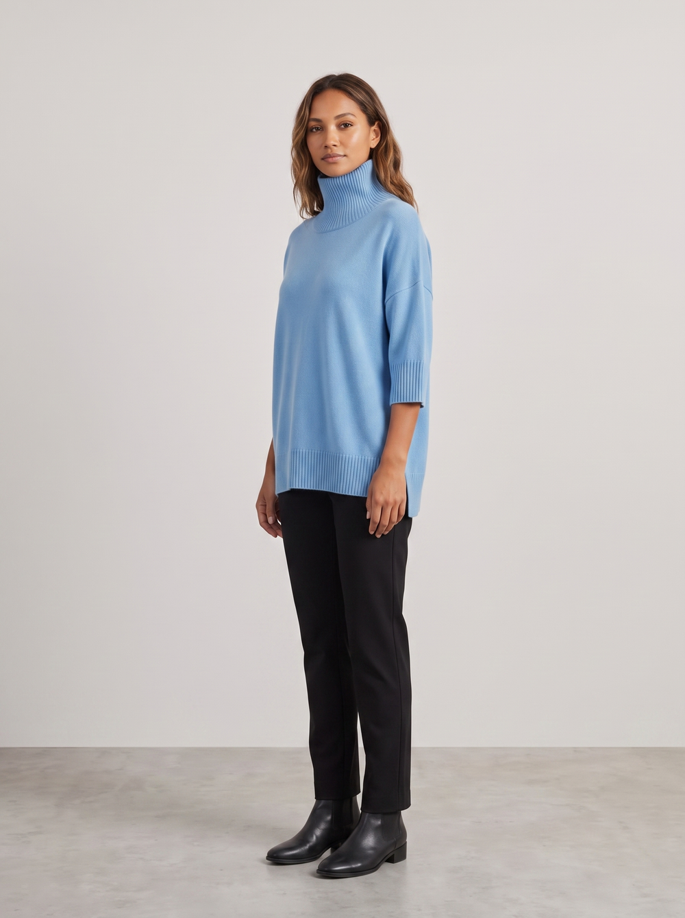 Debra | Women's Comfy Oversized Turtleneck Sweater, side three-quarter view, studio photo