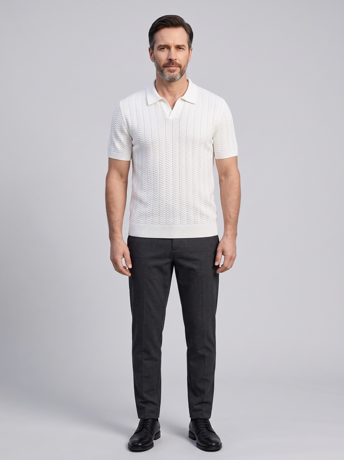 ASCOT Men's Knitted Polo Sweater, worn by a model, full-length studio photo