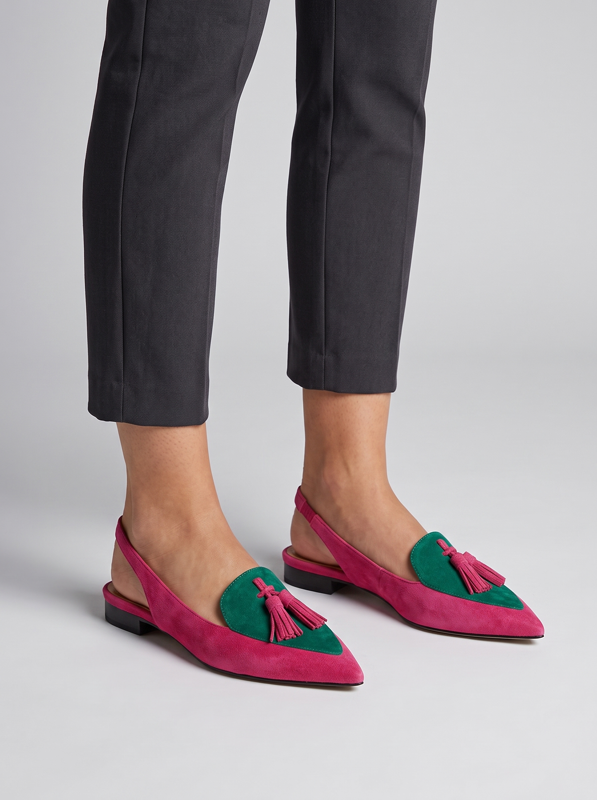 Colette Women's Tassel Backless Flats in pink and green, worn on the foot