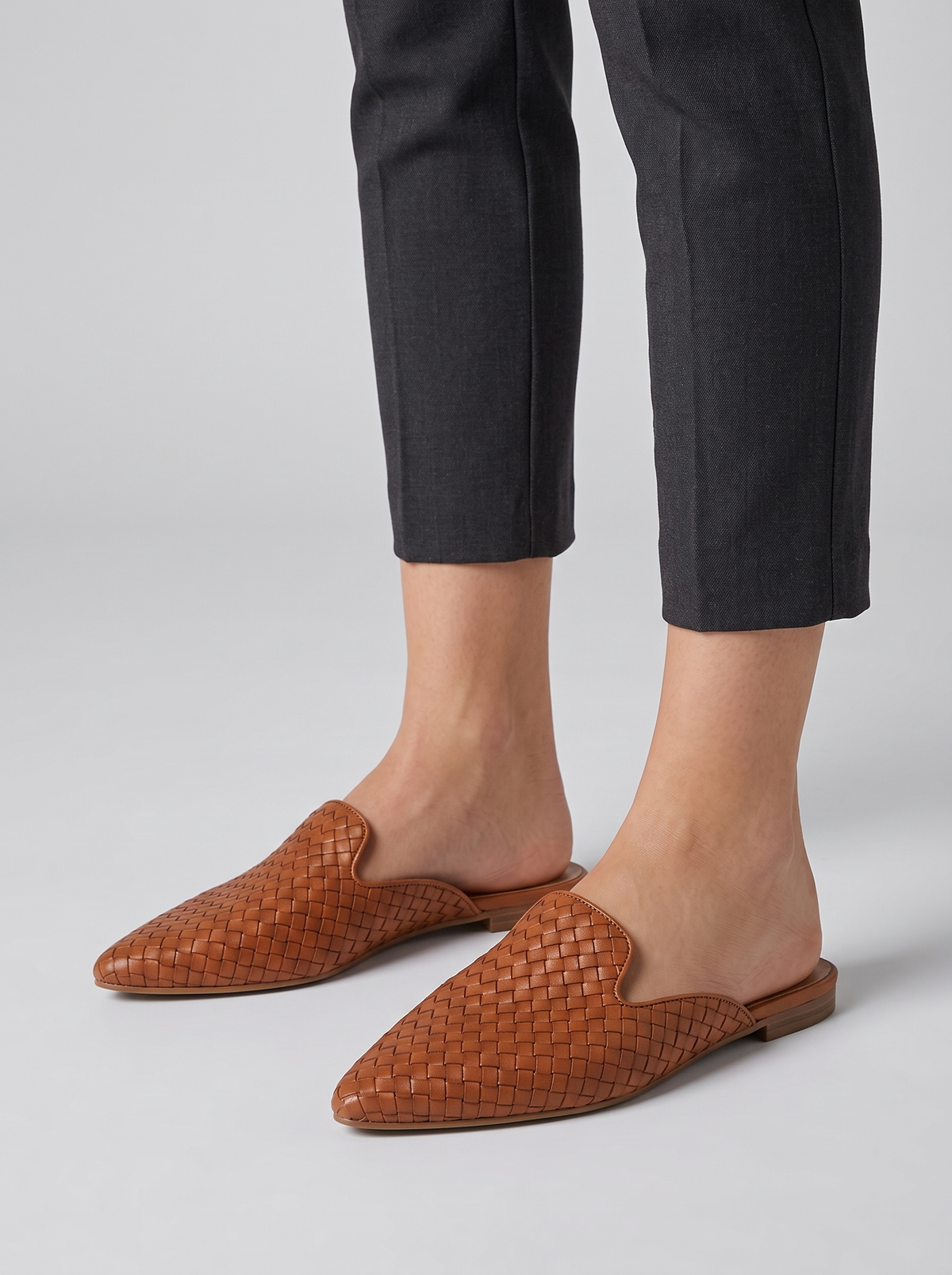 Claire Women's Woven Slip-On Mules in brown, worn on the foot
