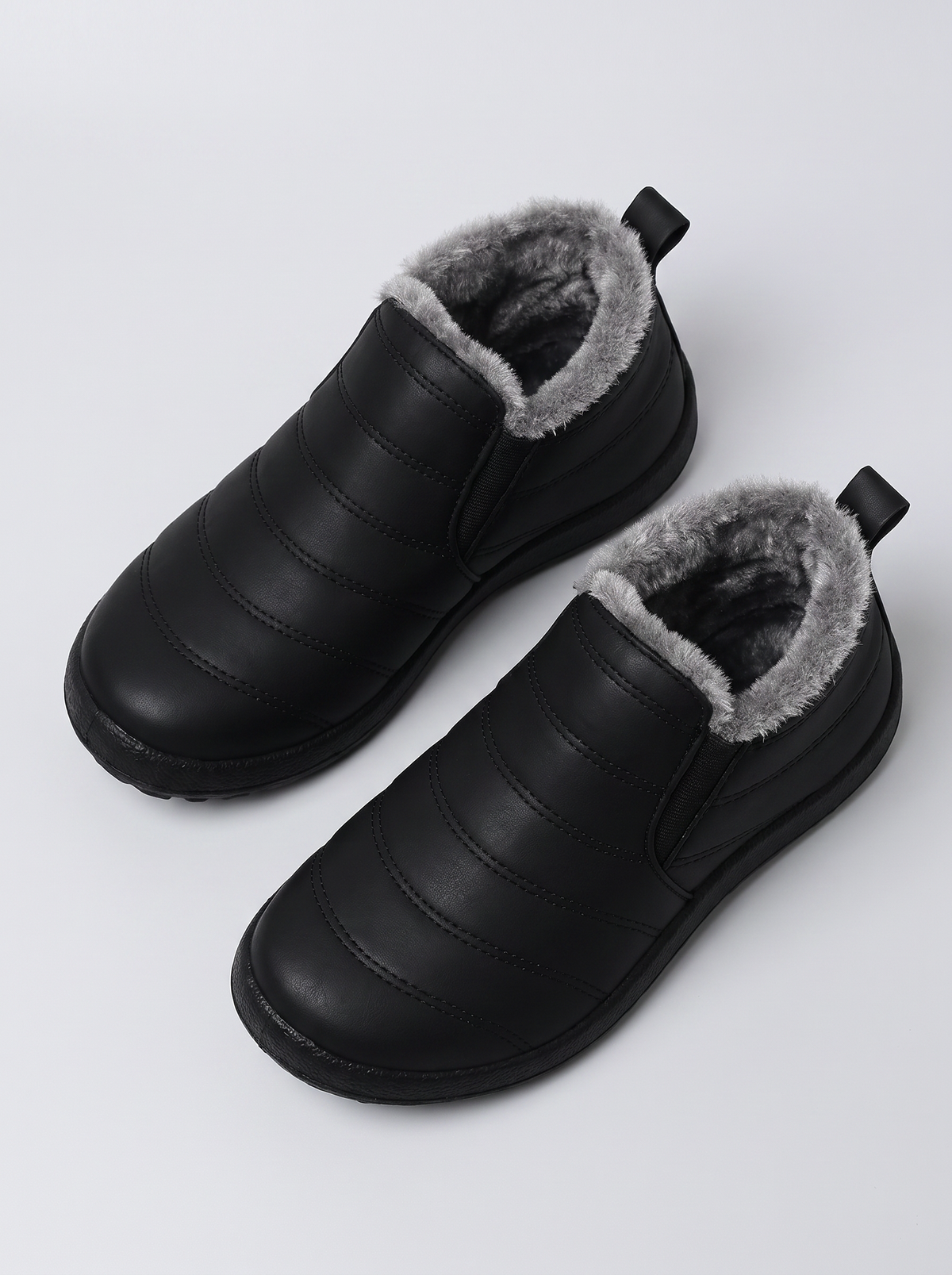 Holly Women's Cozy Slip-On in black, pair seen from above