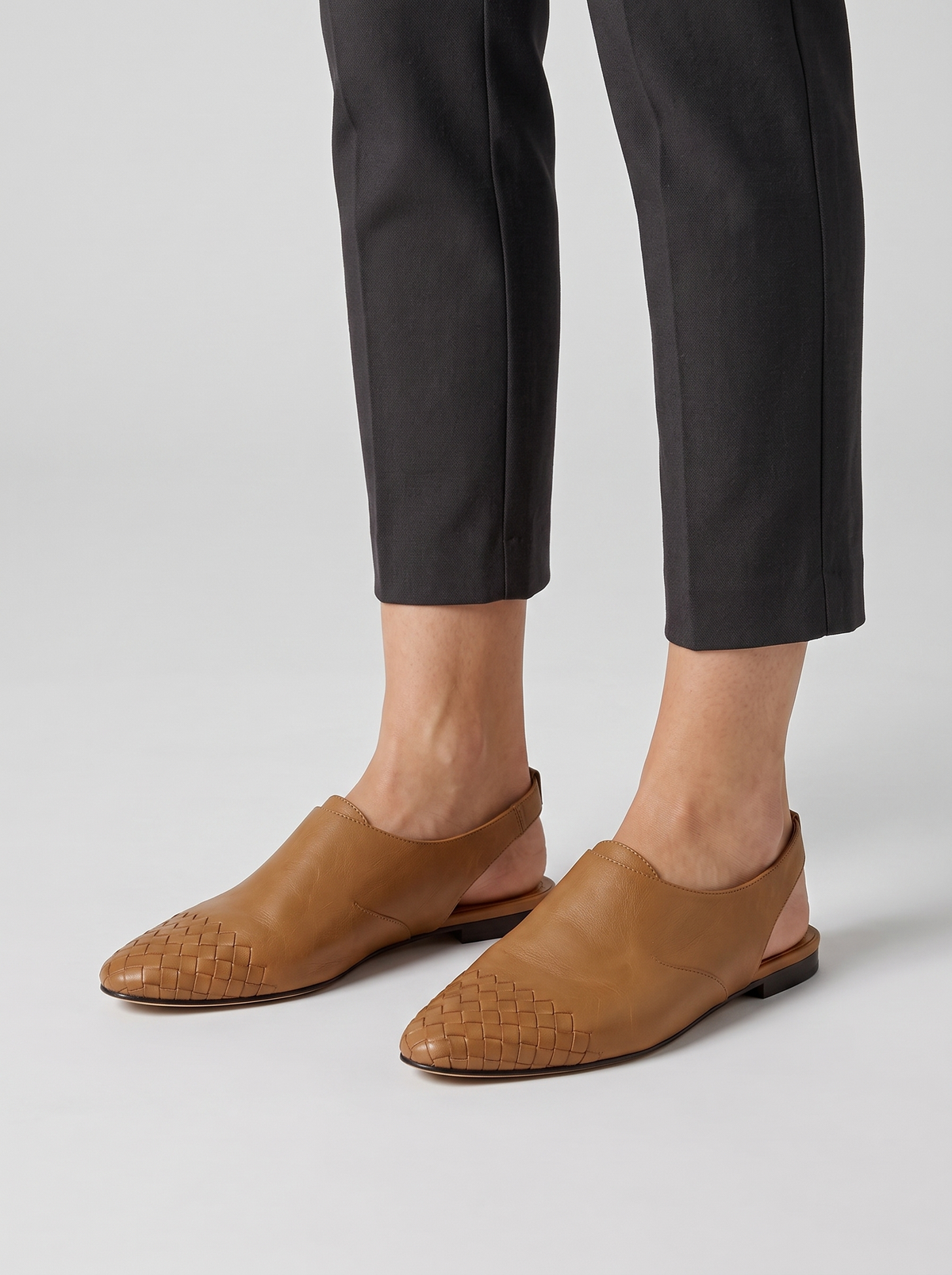 Sally Women's Woven Slip-On Mules in khaki, worn on the foot
