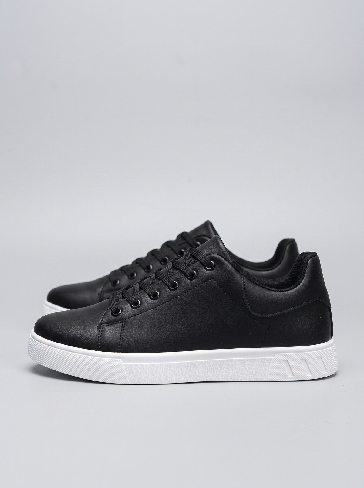 Contrast Men's Lace-Up Sneakers in black, side profile view