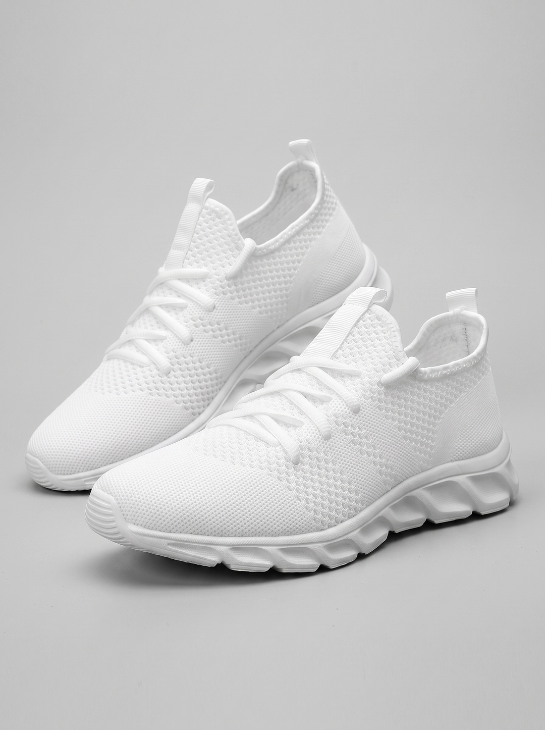 Mesh witte hardloopschoenen paar driekwart