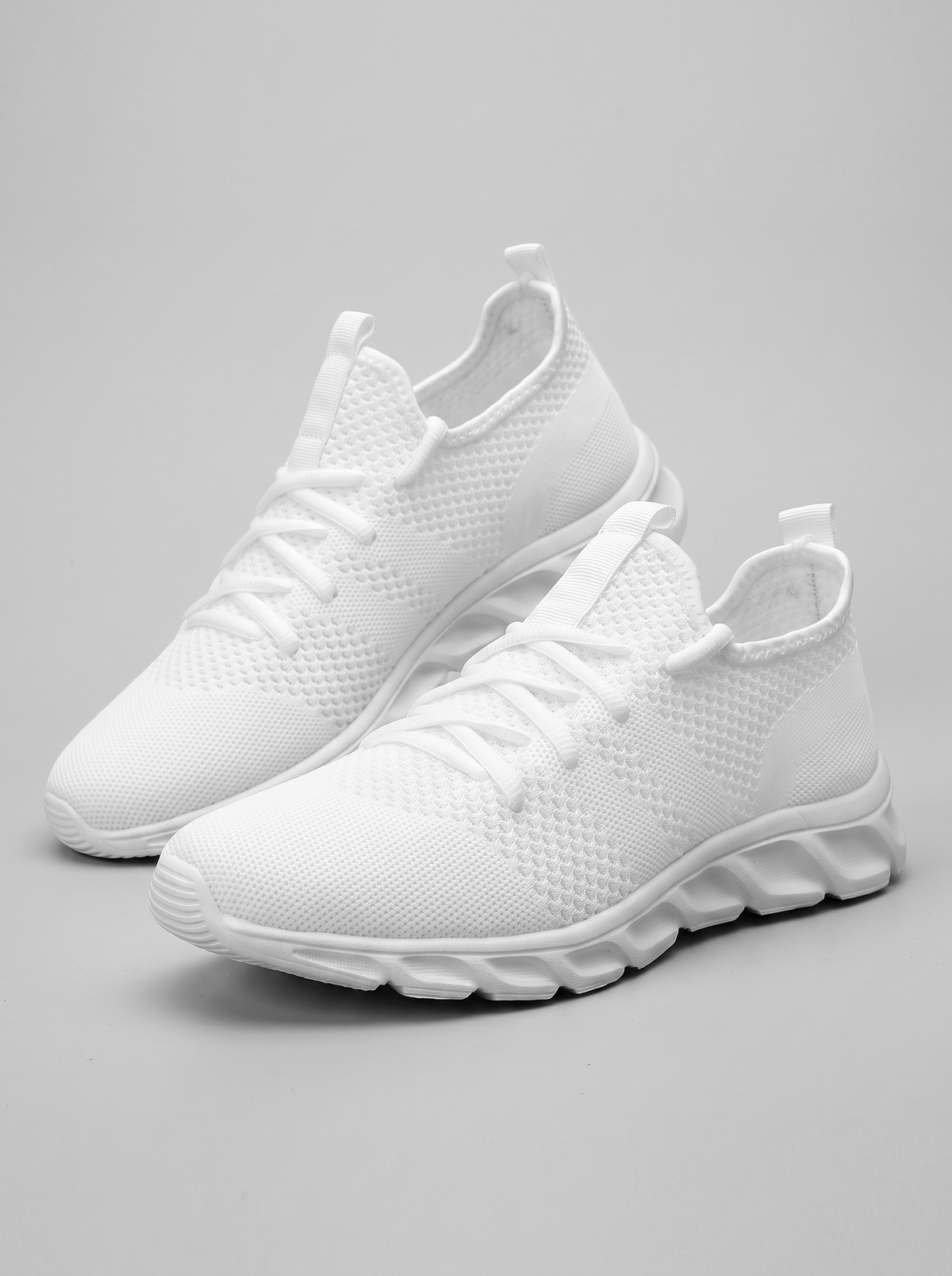 Mesh witte hardloopschoenen paar driekwart