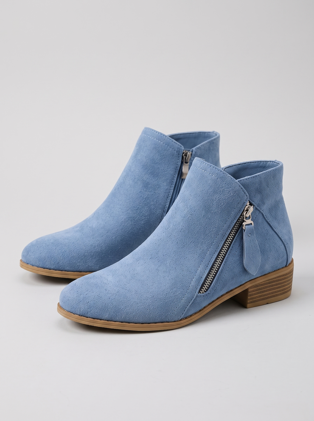 Colleen women's blue suede zip-up ankle boots, pair, three-quarter view